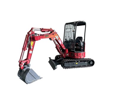 アームを下げるショベルカー